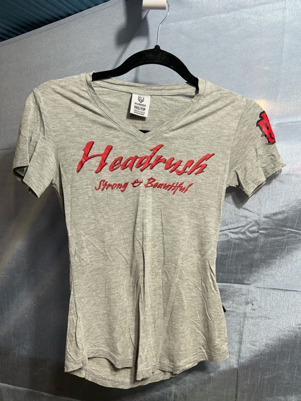 HEADRUSH Women’s Gray V-Neck Tee with Red Logo